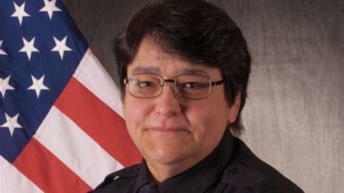 Should a law enforcement officer scream at you for accidentally tripping a alarm taking your child to the restroom and threaten all the parents ?