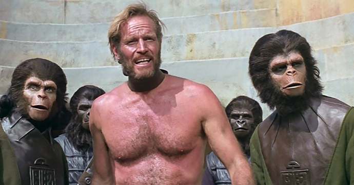 Charlton Heston, taken prisoner by the apes who control the world