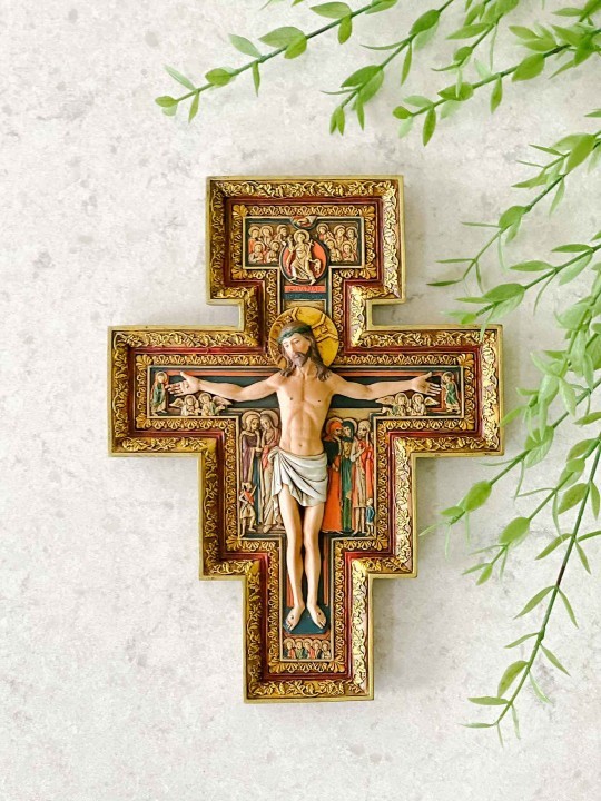 Why do some atheists display a crucifix or images of Jesus in their house?