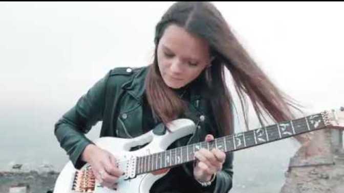 Would you like to see and hear a beautiful woman playing a beautiful song on beautiful Ibanez guitar?