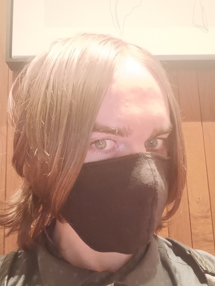 Why is this emo kid wearing a mask?