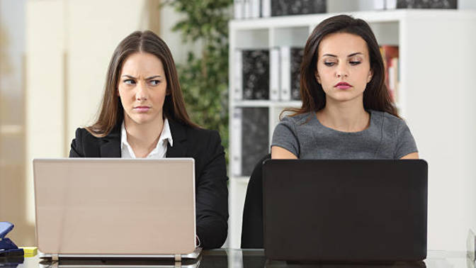 What should I do about a coworker who took credit for work we both did? Should I bring it up in my 1:1 with my manager tomorrow?
