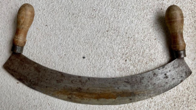 It's an old kitchen tool, what is this?