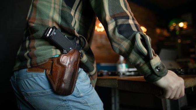 Do you think that allowing gun owners to carry their guns in public places makes these places safer or less safe?