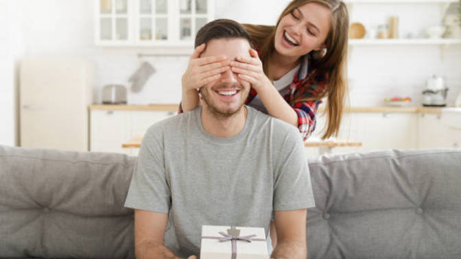 Is it wrong to give birthday present to a guy friend who has a girlfriend?