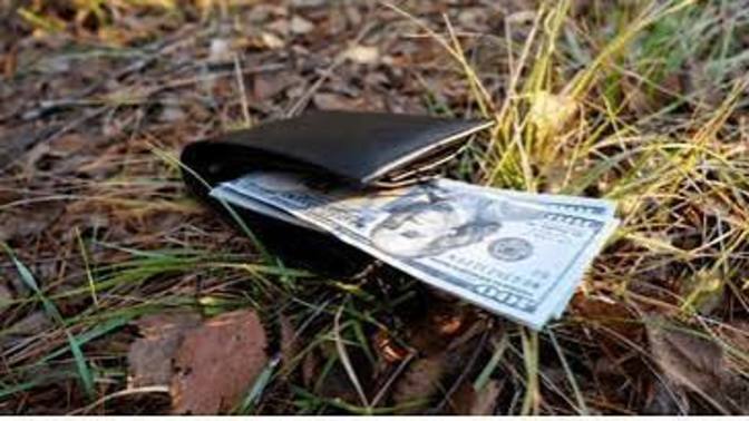 You find a person's wallet or purse on the ground. What would you do with it?