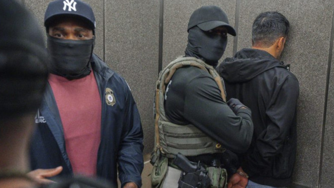 Why are ICE agents allowed to wear masks, not identify themselves and abduct people in unmarked vehicles... how do you know if they aren't criminals?