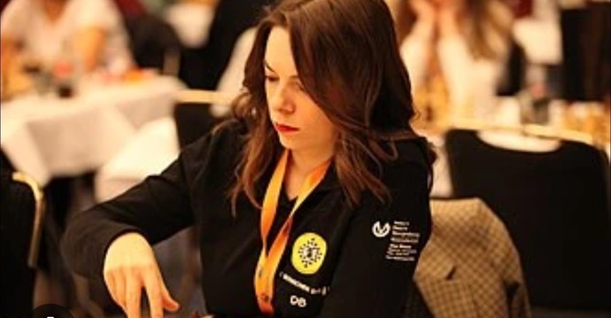 Why do you think that Dina Belenkaya, Womens Chess Grandmaster, says that she likes it when her boyfriend beats her in chess?