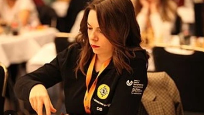 Why do you think that Dina Belenkaya, Women's Chess Grandmaster, says that she likes it when her boyfriend beats her in chess?