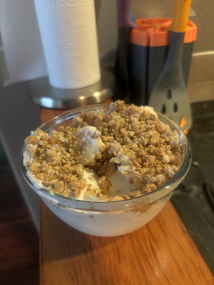 This is a treat I made with honey vanilla yogurt, banana, and granola
