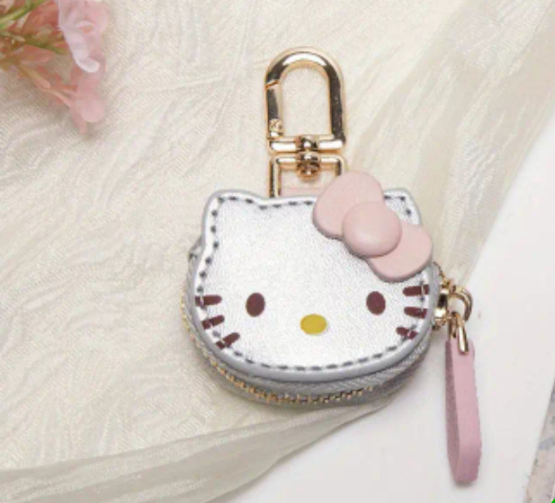 Which hello kitty coin purse is cuter?