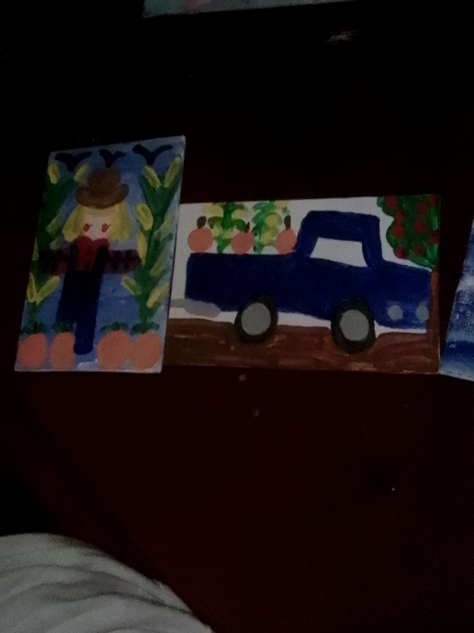 Scarecrow little blue truck