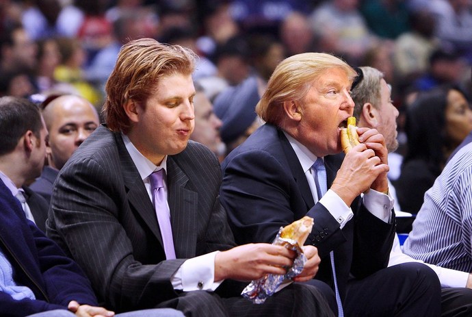 Archive photo of Cheeto and his rat-faced son eating hot dogs like winners.