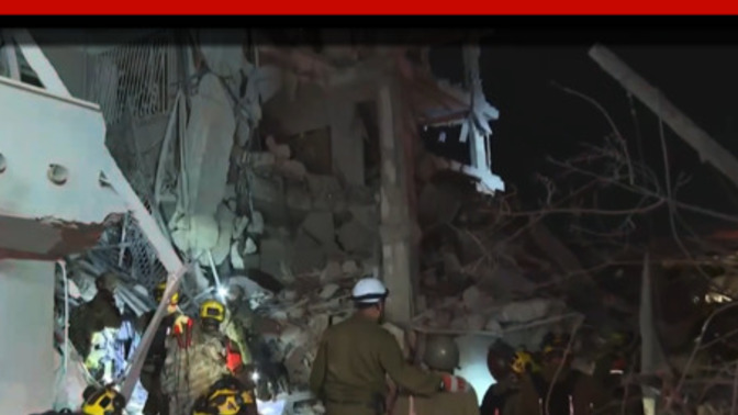 Do you see anything strange about this picture of a bombed building in Israel?