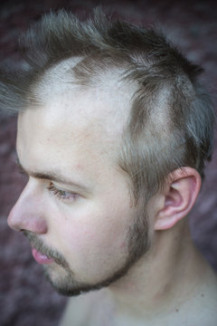 What are the pros and cons of cutting your own hair as opposed to going to the barber?