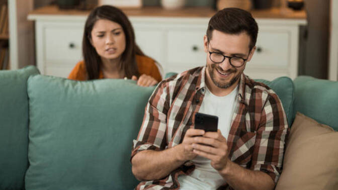 My boyfriend wants to look through my phone, but he doesn't want me to even touch his. Why would he act like that?