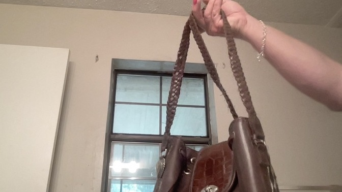 Do you think this bag would be neutral enough that I could carry with a variety of outfits this winter or would a black one be better?
