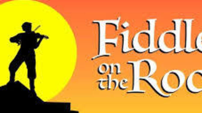 Is the character of the Fiddler on the Roof real or Tevye’s hallucination?