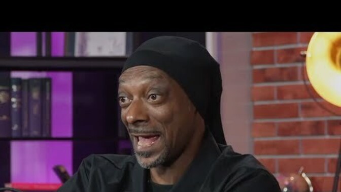 What do you think of Snoop Dogg's reaction to seeing a lesbian couple kiss in a Pixar movie with his grandson? Is he in the wrong?