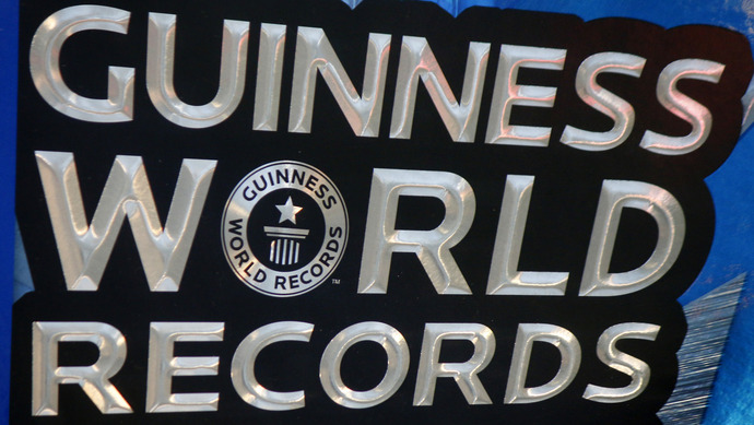 Why does the Guinness Book of World Records includes some irrelevant and meaningless records?