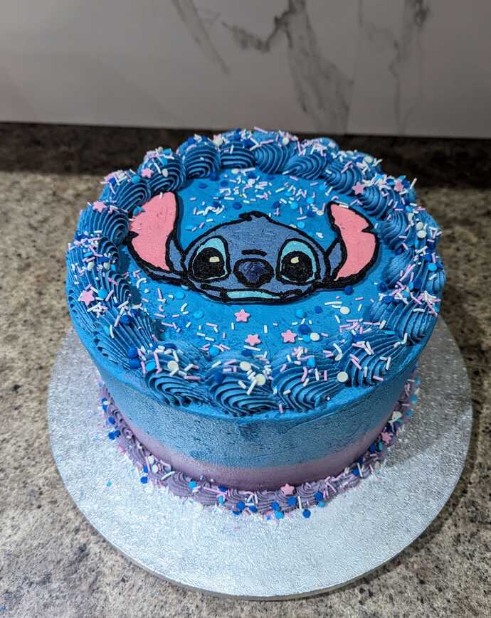 My 3-Year-Old niece is a big Lilo& Stitch fan. What do you think of the cake and biscuits I made for her birthday?