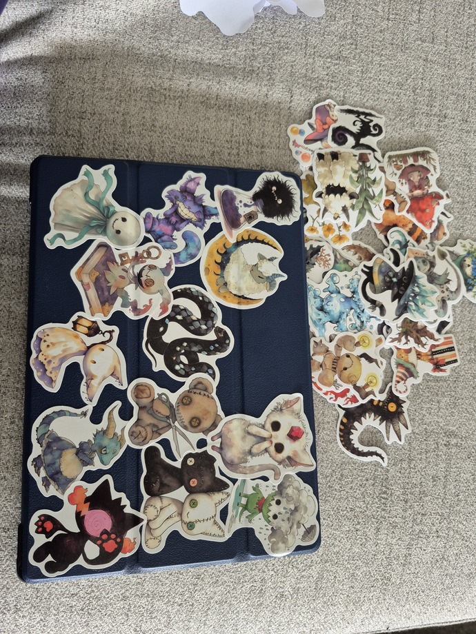 Losing my mind in pain so im covering my tablet in stickers what do you think?