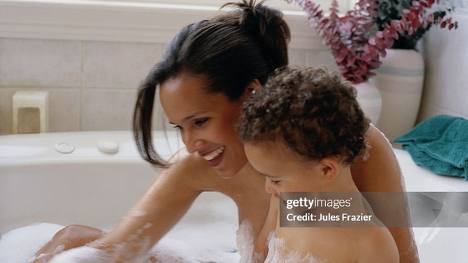 Is it normal for my girlfriend to shower with my neighbours 4 year old son?