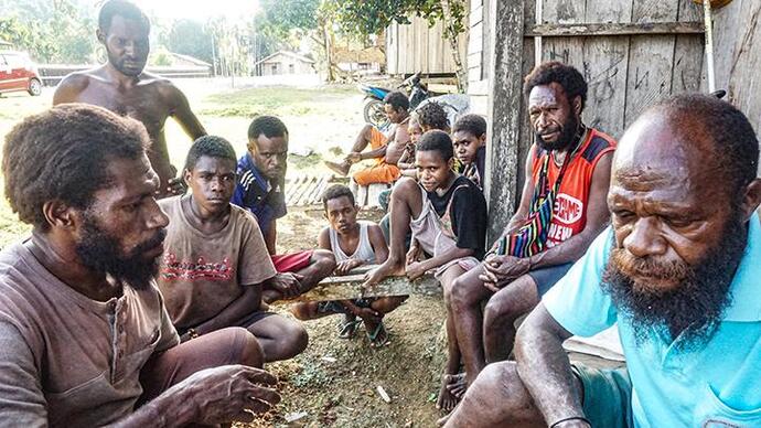 Who looks cooler in appearance to you... Papuans or West Africans?