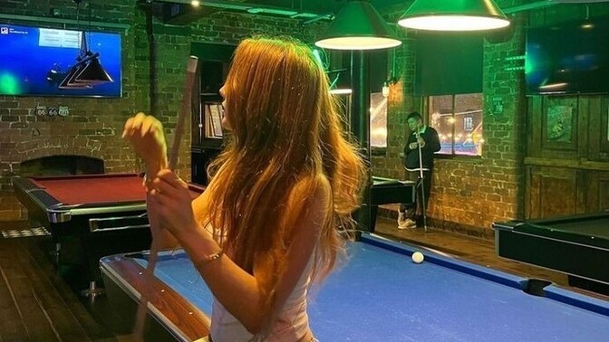 I'm going to play billiards with you, what would be the length of her skirt?