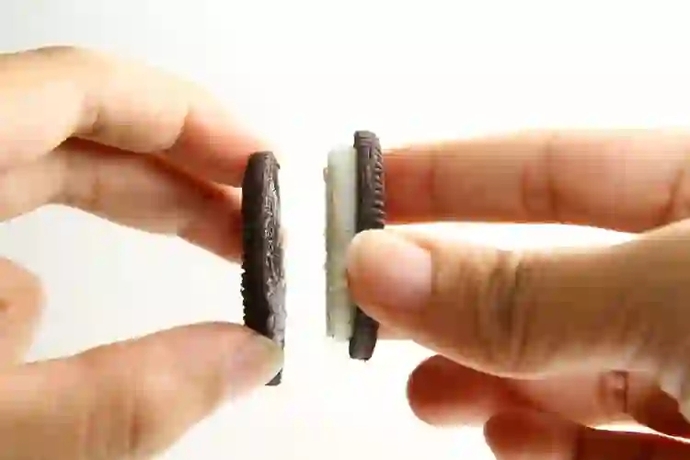How do you eat a black and white cookie?