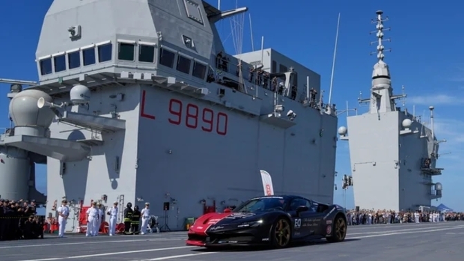 What do you think about a guy going 100+ MPH in a car on an aircraft carrier?