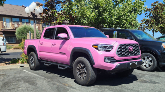 Guys, what would you think if your friend came over to visit and he drove up in a pink Toyota truck?