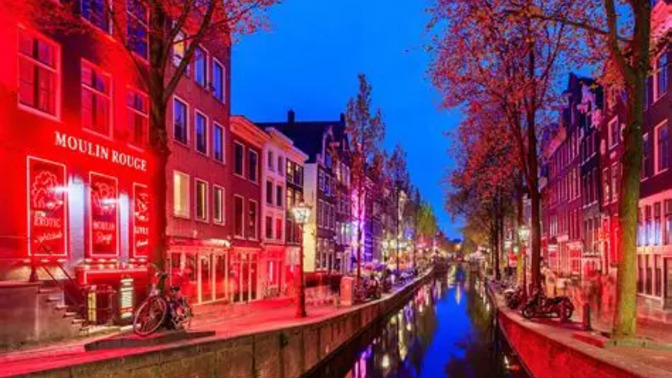 My wife told me to do whatever I want in Amsterdam's Red Light District, should I?