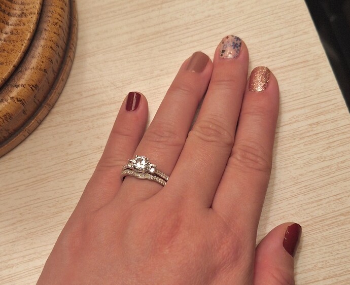 What do you think of my engagement and wedding rings?