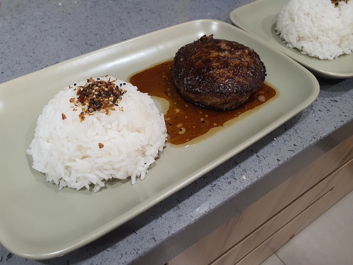Japanese style hambagu steak, seared and butter basted with aromatics and served with white rice and furikake.