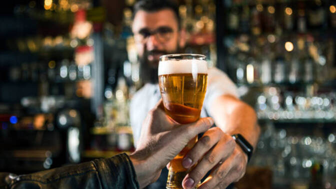 If you go to a pub, bar or any place that serves alcohol what is the first drink you usually like to have? And do you like it with ice or without?