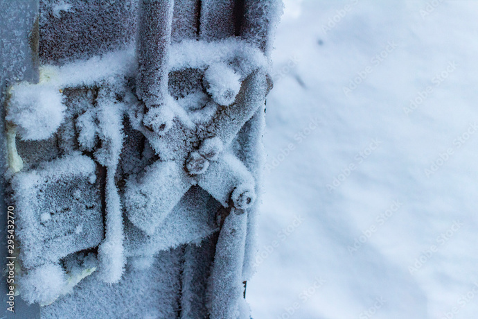 If space is freezing cold, how do space suits and satilites not freezing solid?
