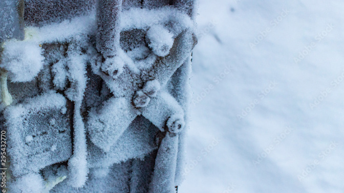 If space is freezing cold, how do space suits and satilites not freezing solid?