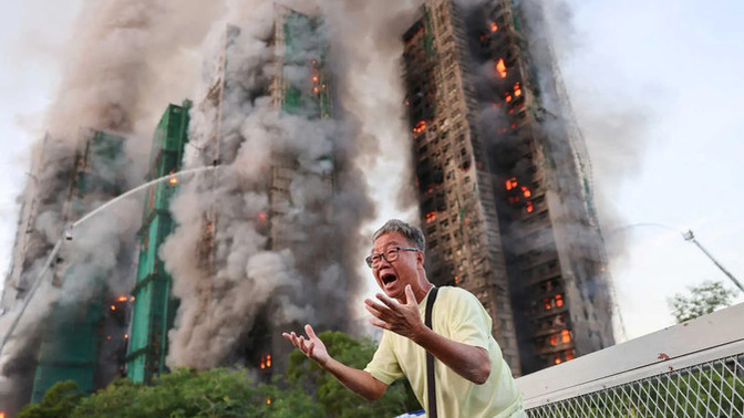 How sad is the huge high-rise fire in Hong Kong?
