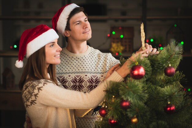 Do you make it a point to decorate for the holidays with your partner if you dont live together, or do you do it separately at your own places?