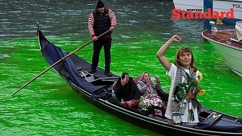 What kind of liberal bonehead would die the Venice canals green?