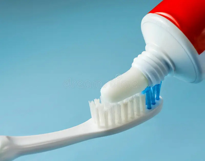 How do you SQUEEZE the TOOTHPASTE tube?