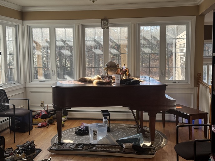 The only thing I own in this picture is the piano, the stuff on it and the the tools in the back