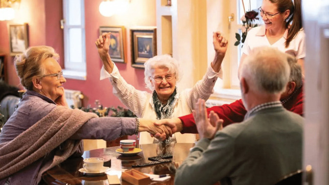 Why are more families preferring paid retirement homes for elderly care?