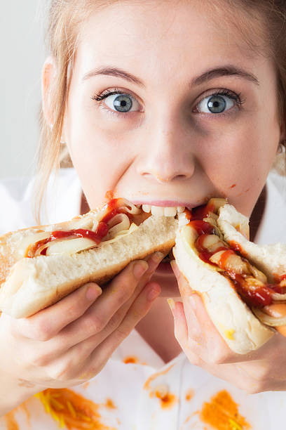 When eating a hotdog which end do you start at?