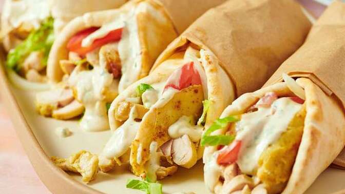 Do women prefer beef or chicken shawarma?