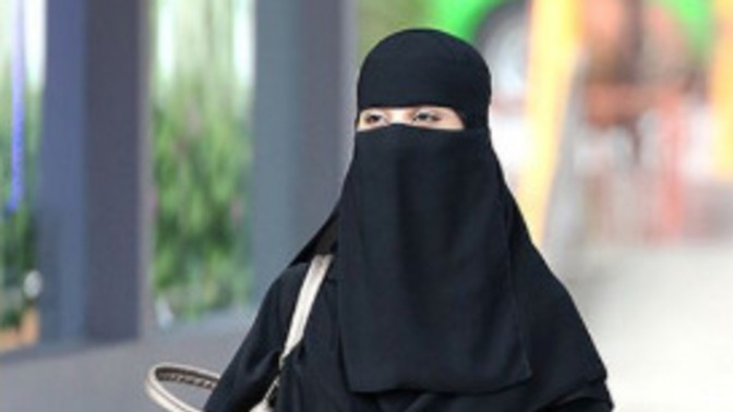 If a Woman can Hide her Identity in a Burka, what's wrong with an ICE agent wearing a mask?