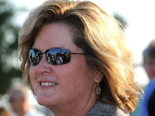 Can Suzan watch NASCAR all day, drink beer, and still be COS?