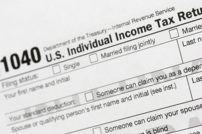 If a protestor is being paid to protest, should they claim that income when they file their tax returns?