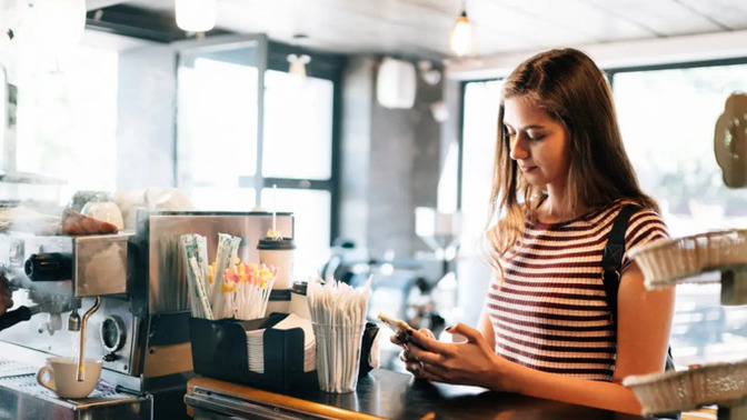 How do I approach a girl obsessed with her phone and Starbucks?